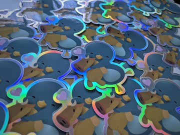 En hel hög med fräcka Linuxkompis-klistermärken.